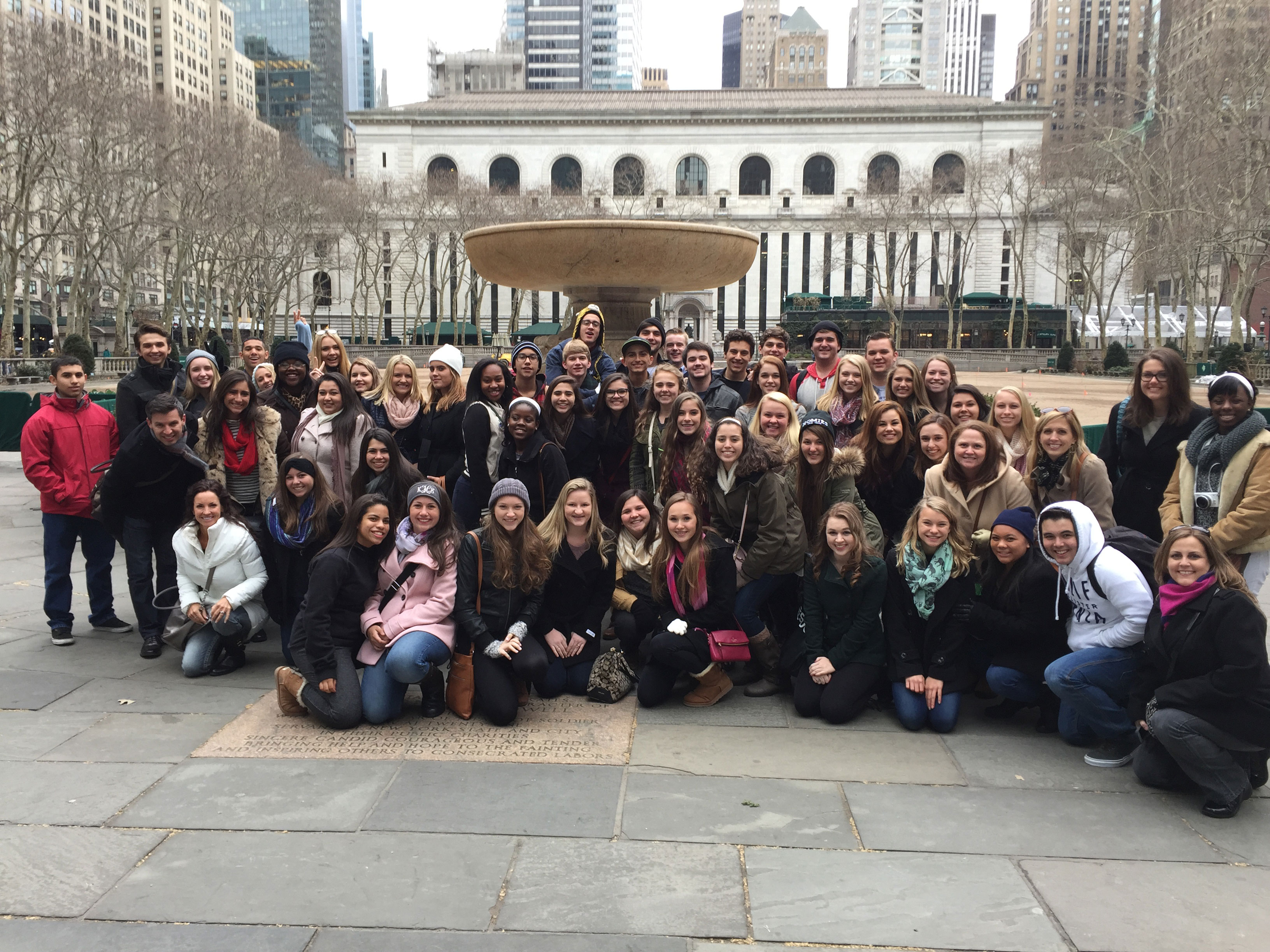 Students gather for a group photo in Bryant Park