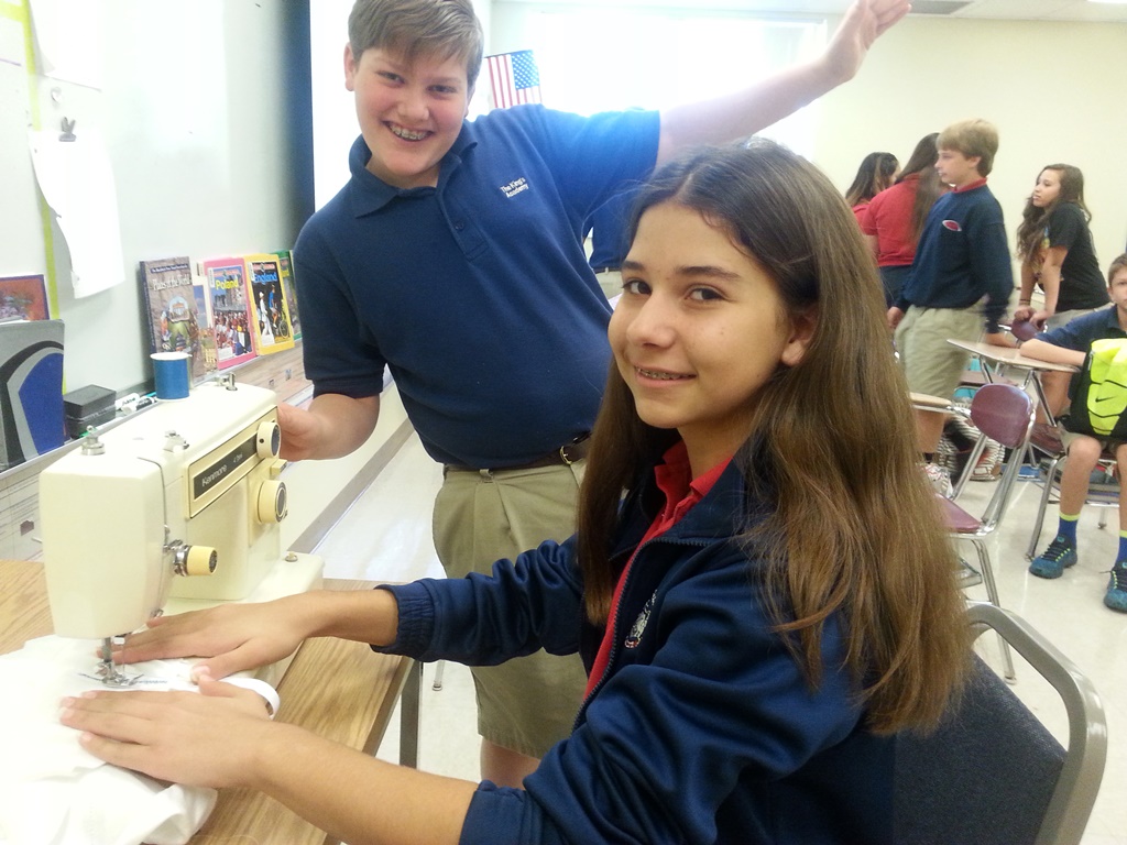 Victoria Moore using her sewing skills