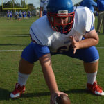 center hiking the ball