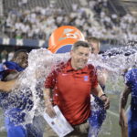 Coach Keith Allen gets Gatorade bath